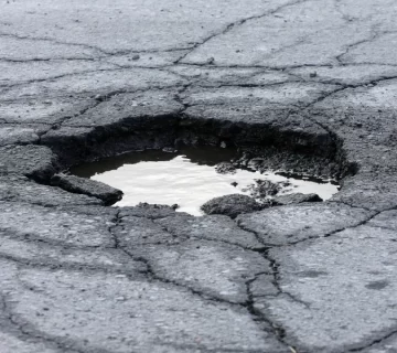 What to Do If You Hit a Pothole: Tire and Rim Damage Tips